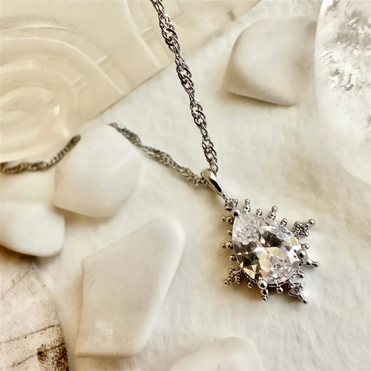 Cindel Teardrop Charm Necklace With Rhinestone Baguettes