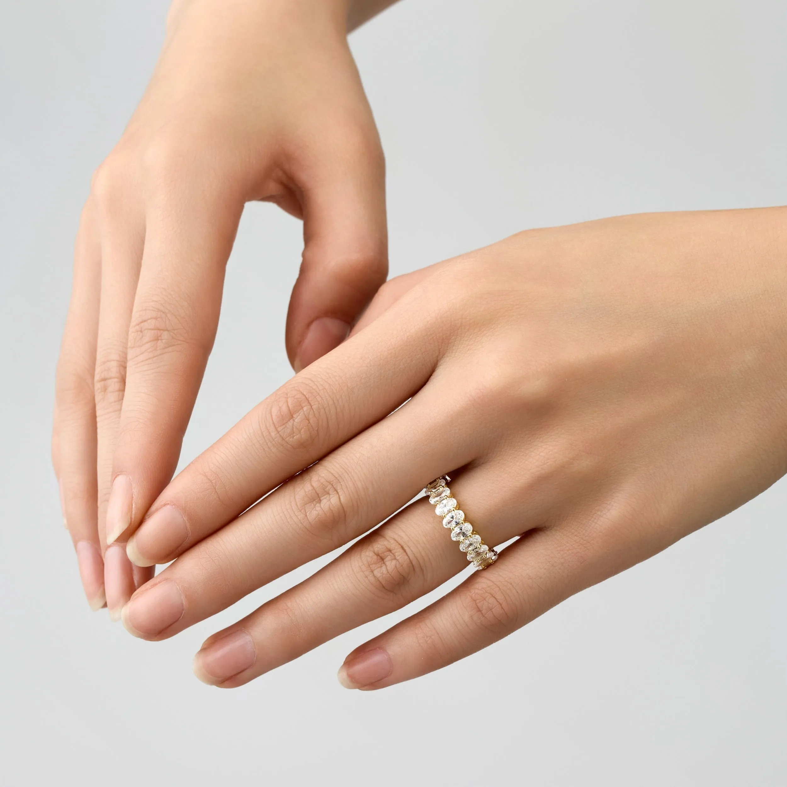 Diamond White Oval Cut Eternity Wedding Band - Gold